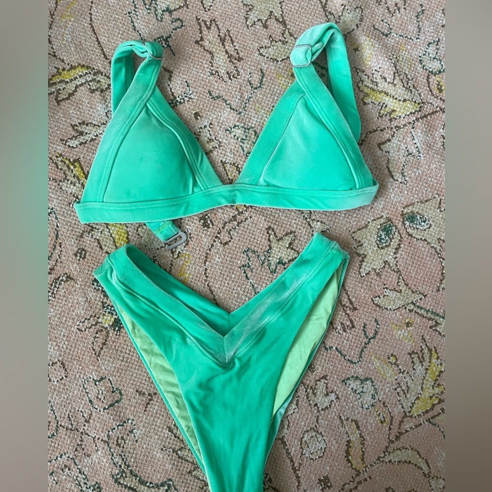 This is a XS one one swimwear suit. It is a velvet material.